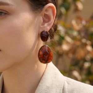 Boucle d'oreilles dorées - image 2